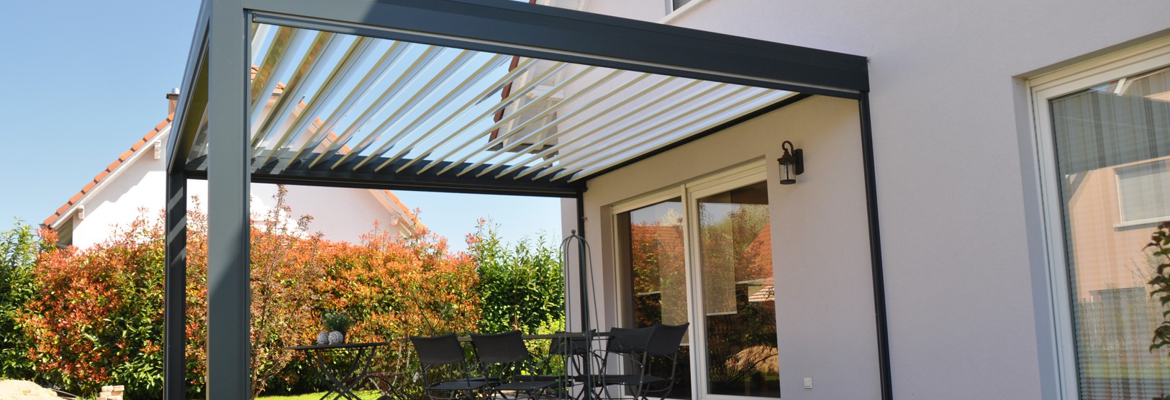 Maison avec pergola bioclimatique