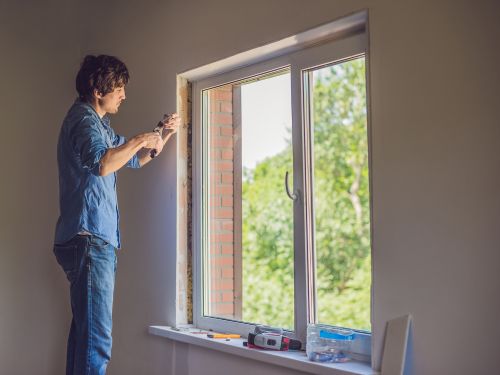 La pose de fenêtre en applique avec tapée